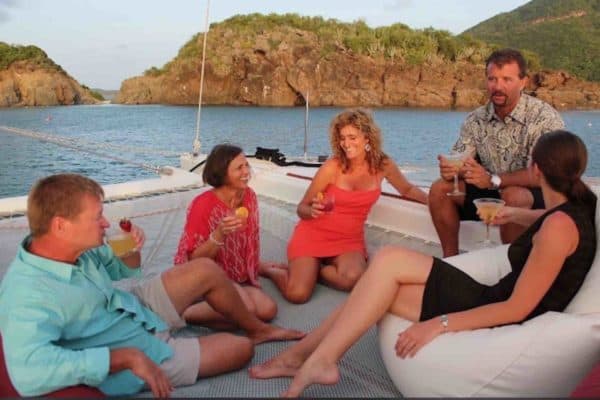 San Blas Sailing charter catamaran guests with cocktails