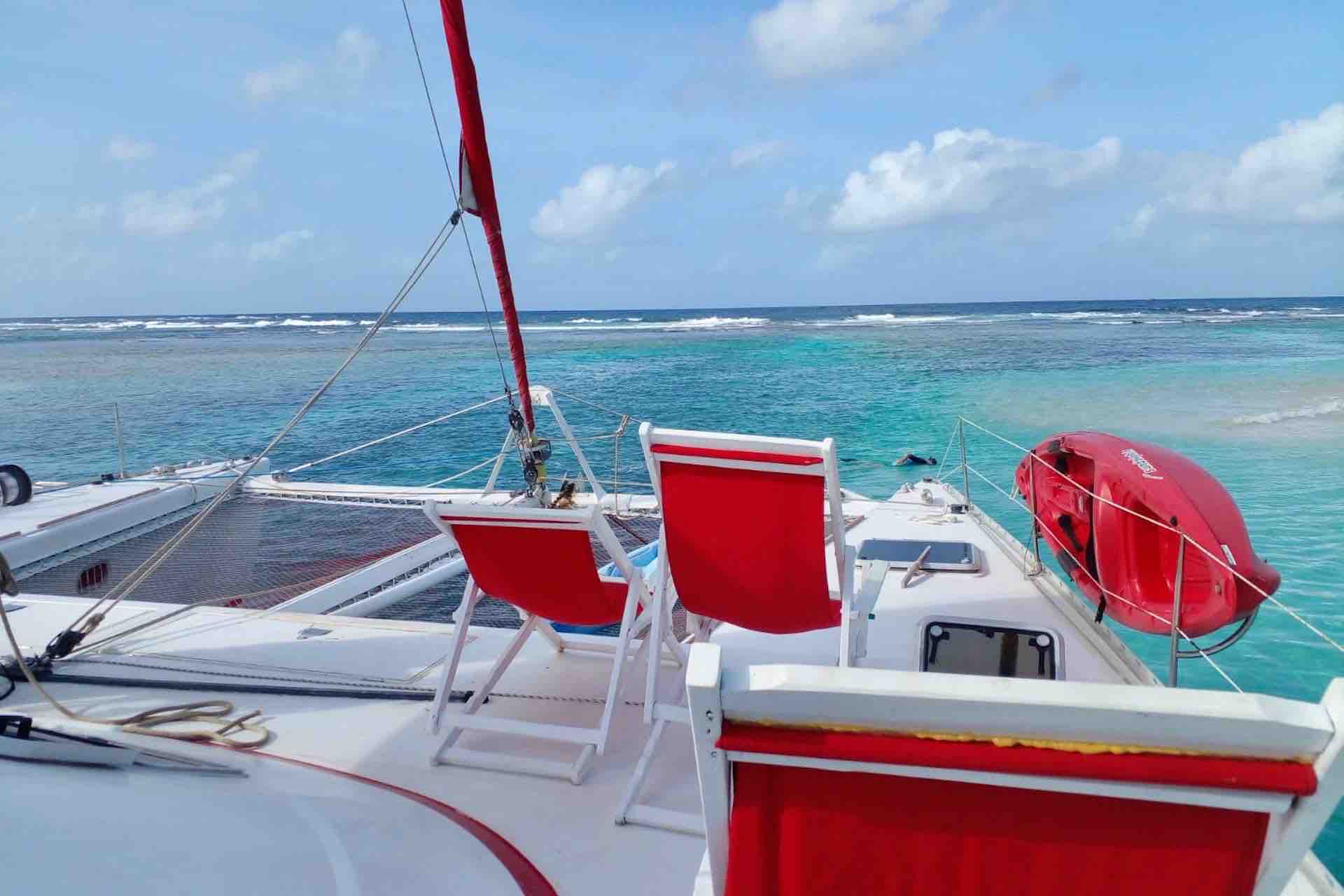 sail San Blas catamaran islands charter deck with sun chairs
