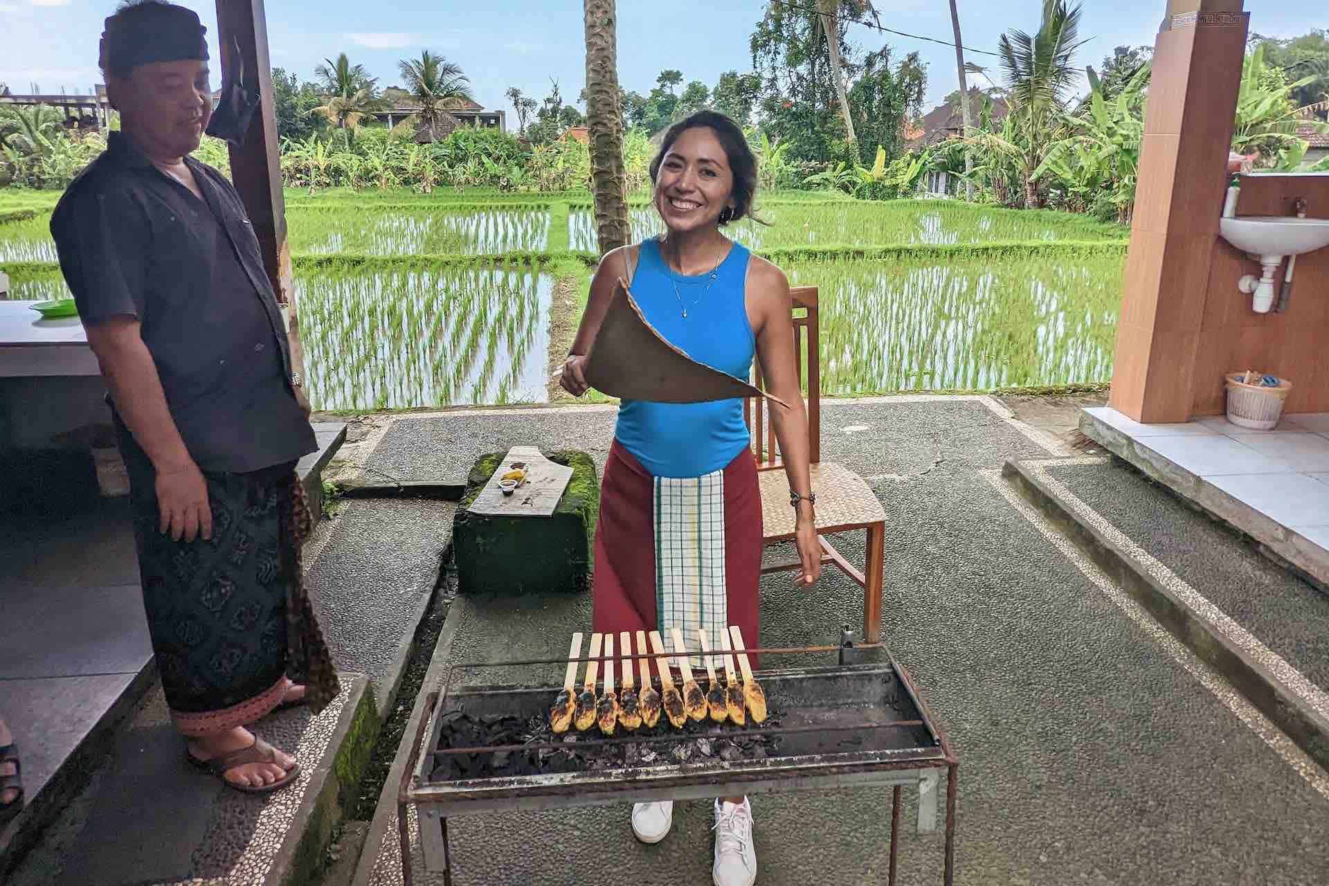 Bali cooking class woman learning satay