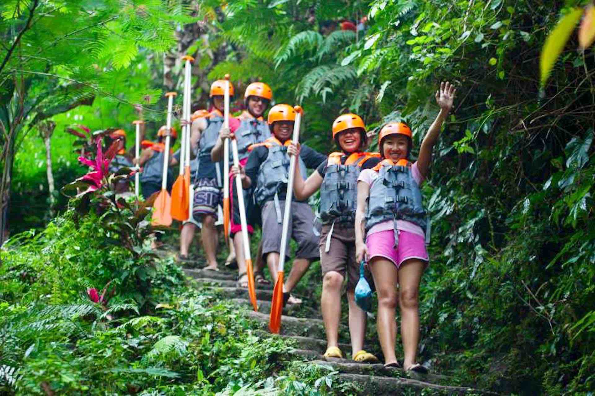 Bali River Rafting Ubud tour in Ayung river happy guests descending stairs