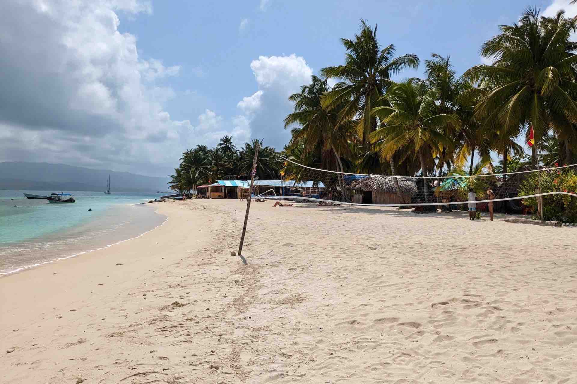 Isla Miro San Blas private cabins beach view with volleyball net