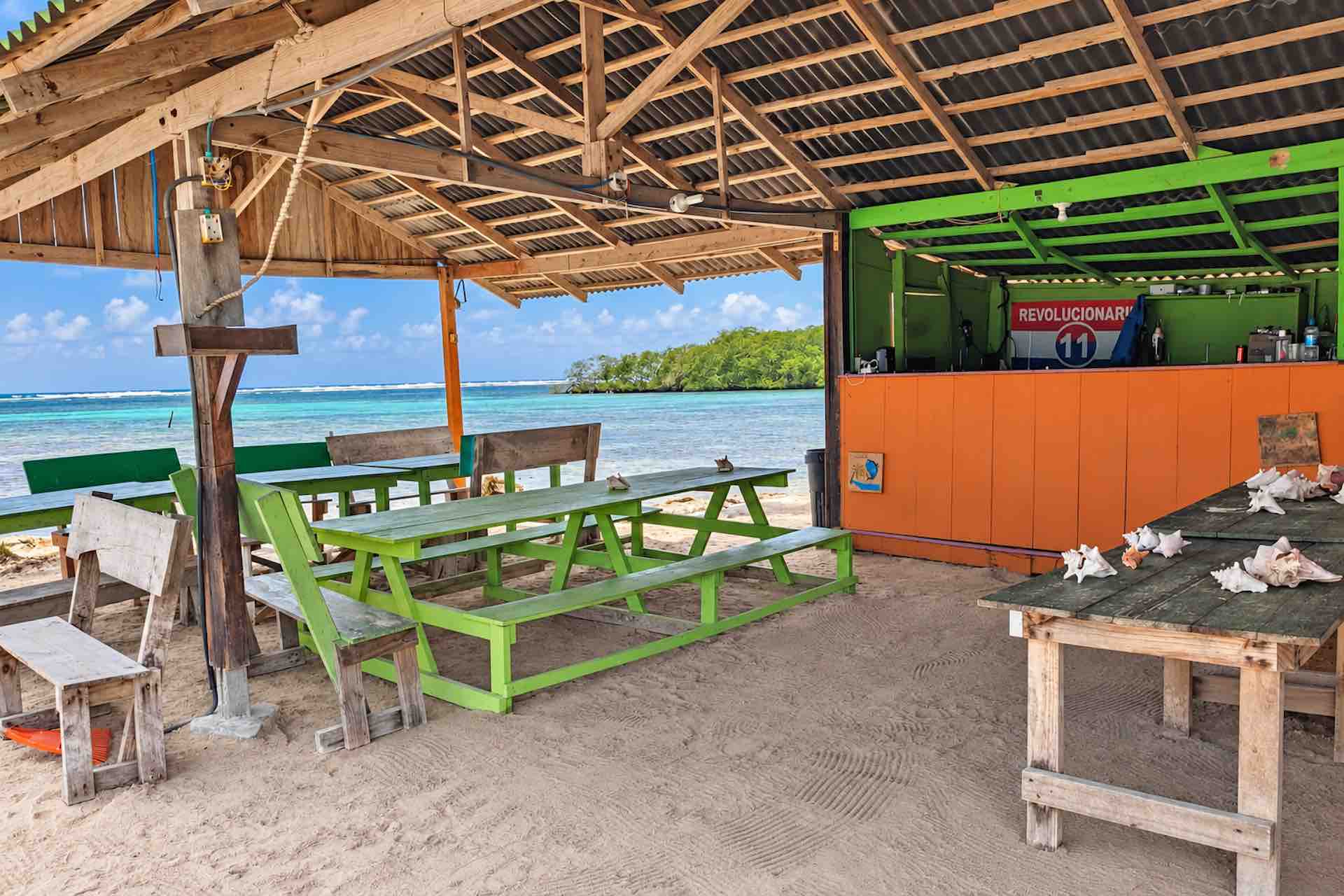 Open-air beachside dining area on Isla Miryadup
