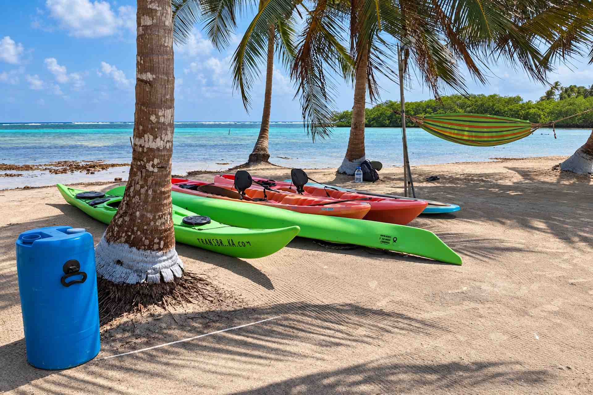 Kayaks beside the beach on Isla Miryadup, San Blas