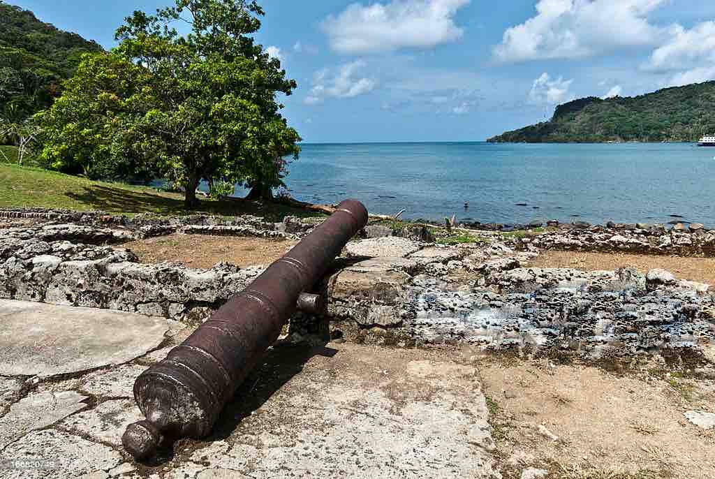 Historic cannon at Fort San Lorenzo pointing toward the water on the Ocean to Ocean Panama Canal Tour