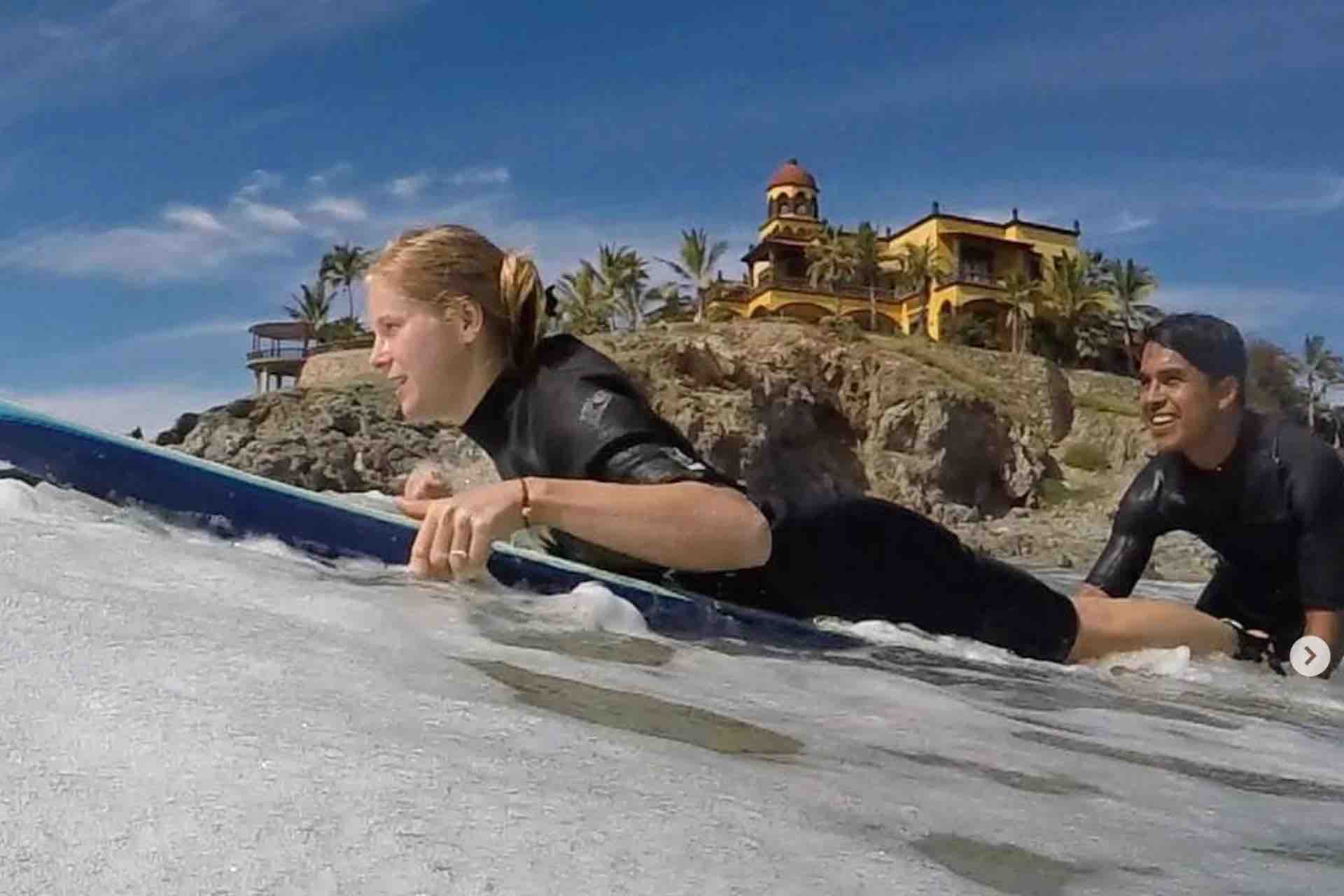 Surfing Cabo San Lucas beginner surfer with instructor