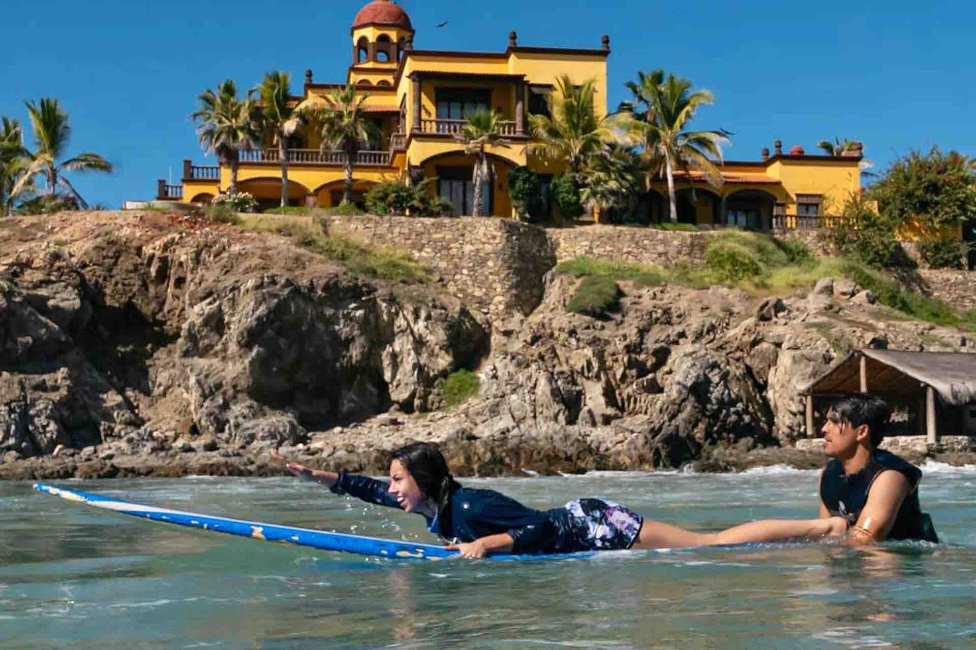 Surfing Cabo San Lucas happy surfer and instructor