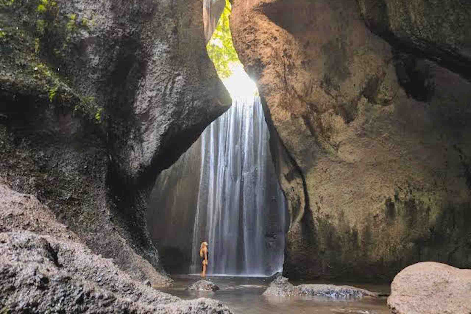 Bali Instagram Tour woman under waterfall