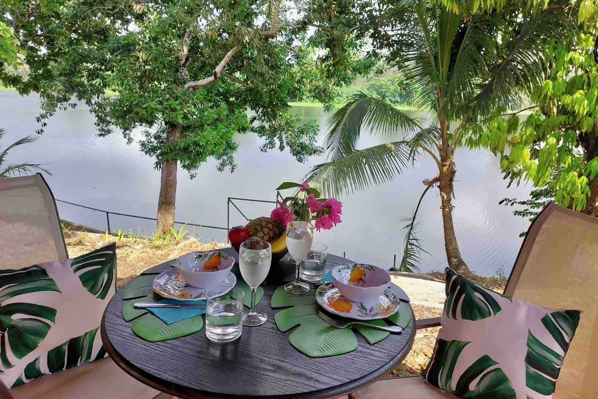 Chagres National Park lodge guesthouse outside dining table witih lake view