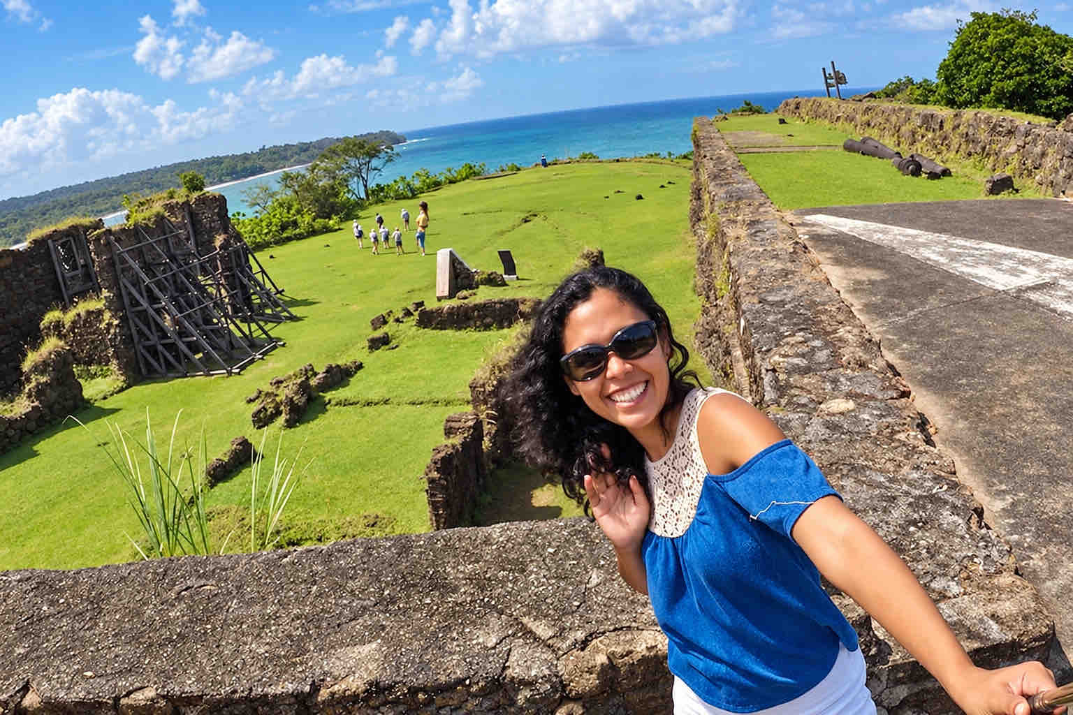 Visitor taking a selfie overlooking Fort San Lorenzo.