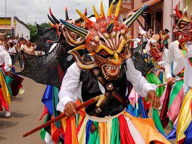 Diablicos Dancers at Corpus Christi in Panama Traditional diablicos dancers performing at Corpus Christi Festival in La Villa de Los Santos
