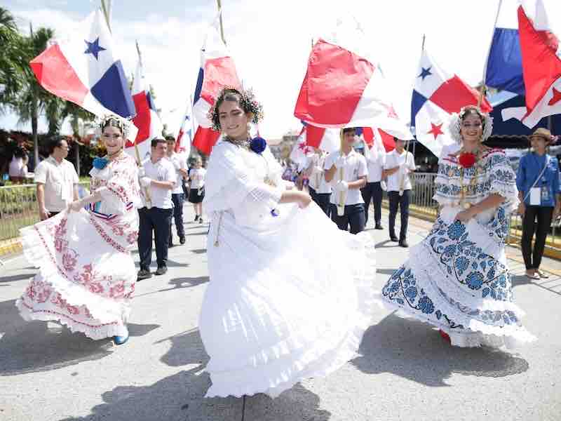 Independence Day Parade in Panama Parade with women in empolleradas dress and flags during Panama’s Independence Day, Panama Independence Day, Fiestas Patrias Panama