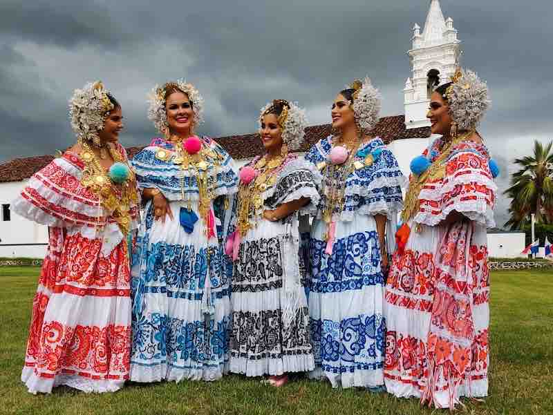 Pollera Parade in Las Tablas Women wearing ornate traditional pollera dresses at Panama’s National Pollera Festival