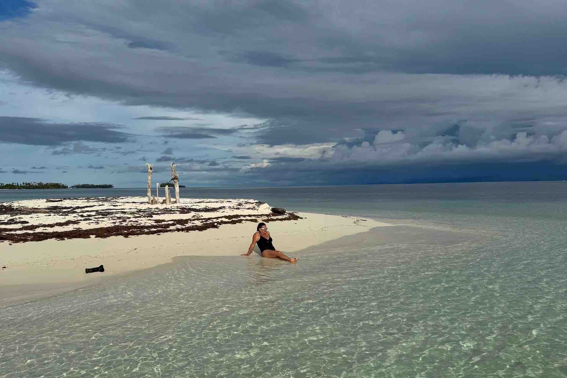 San Blas islands tour Holandeses panama woman relaxing on beach